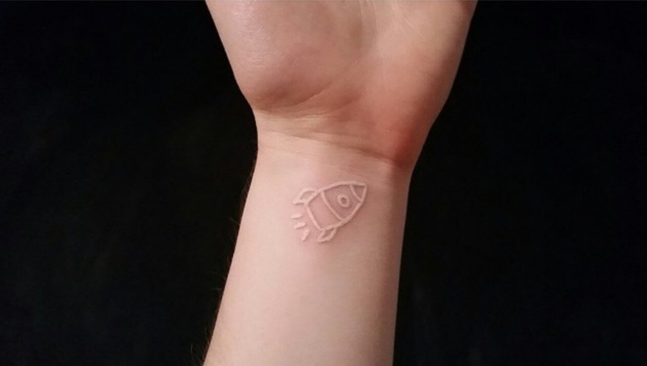 Rocket tattoo made with white ink