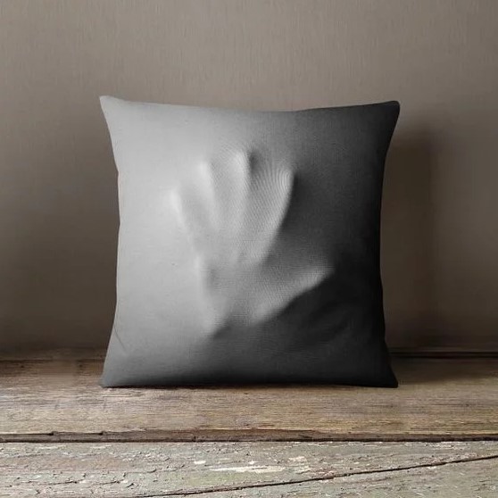 Pillow with one hand.