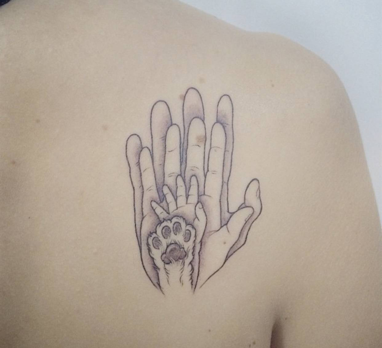 Family hands tattoo