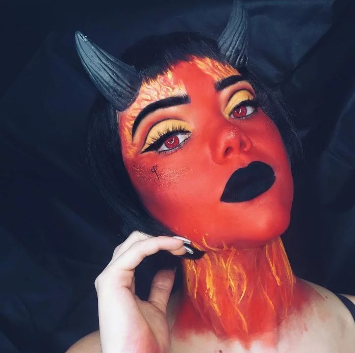 Woman made up as devil