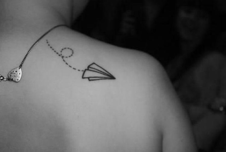 Paper airplane tattoo