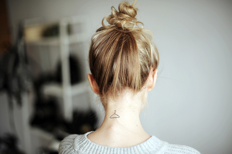 Hanger tattoos on the neck