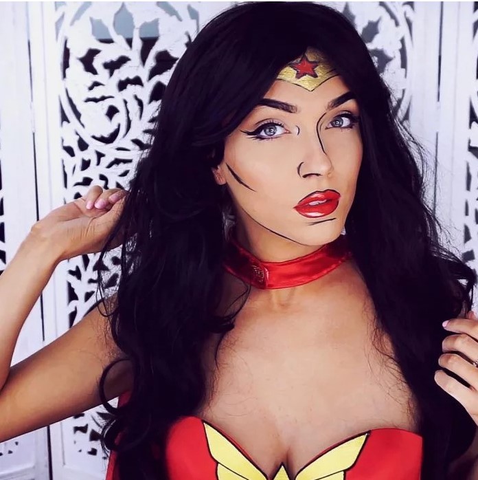 Woman with makeup and costume of the wonder woman