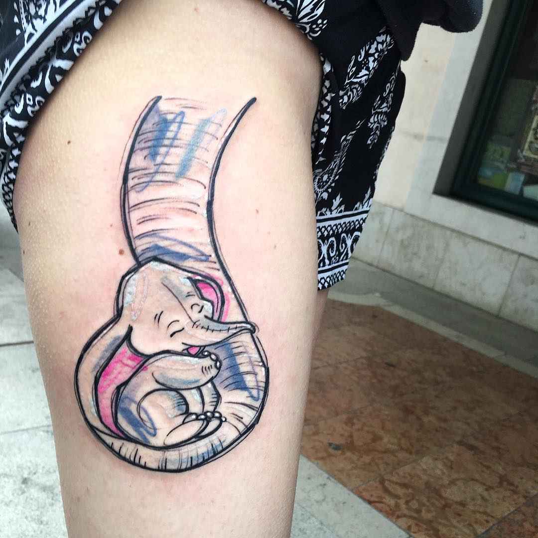 Dumbo tattoo hugging his mother