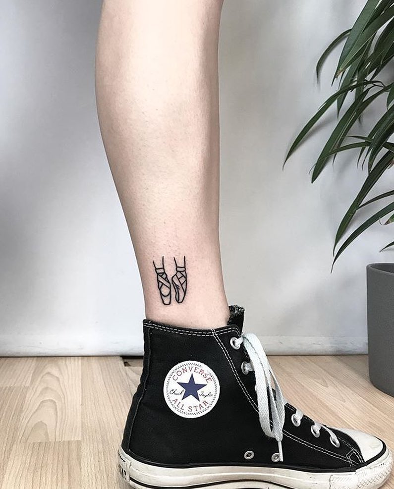 Girl with ballerina shoes tattooed on her foot